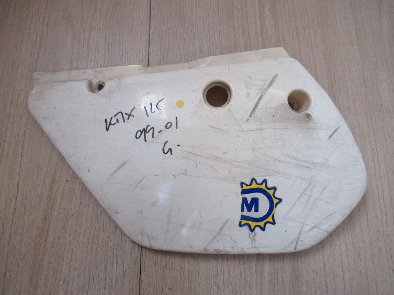 Cache latéral gauche Kawasaki 125 KMX 1999-2001