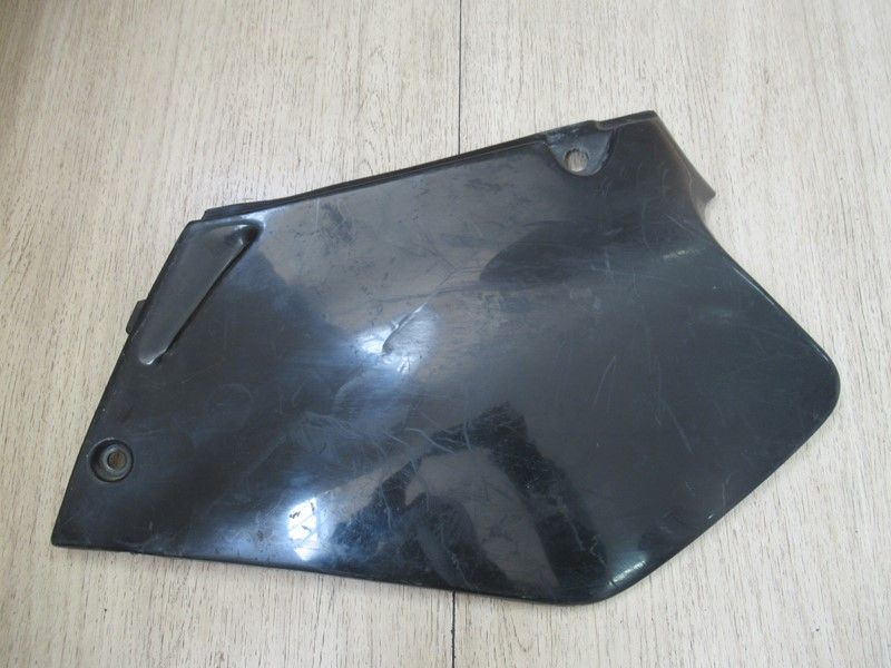 Cache latéral arrière gauche Honda 125 CR 1995