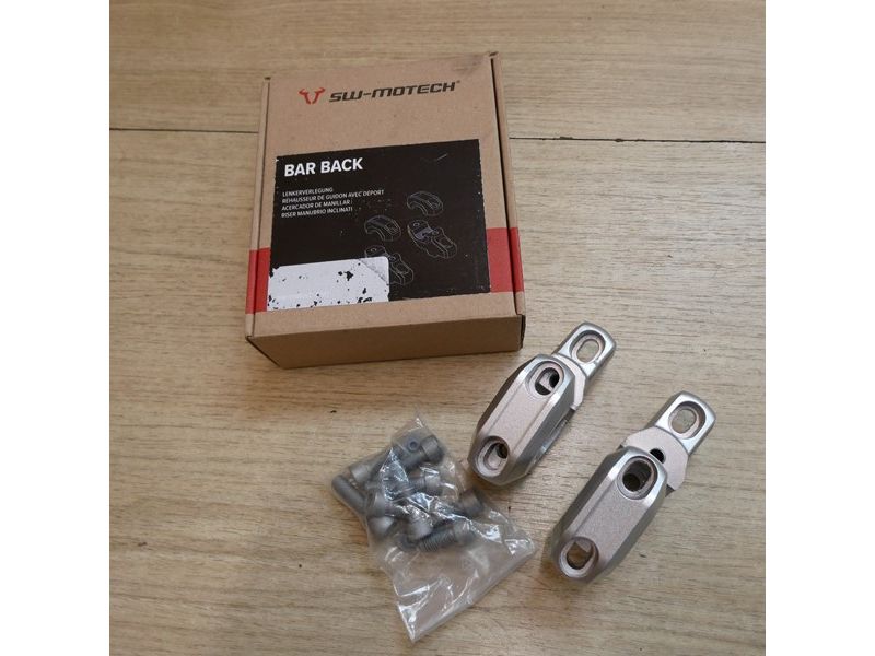 Réhausseur de guidon avec déport 