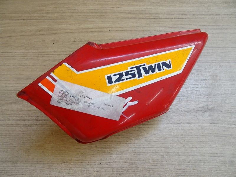 Cache latéral gauche Honda CB 125 Twin 1978-1980 (83640-399-0000)