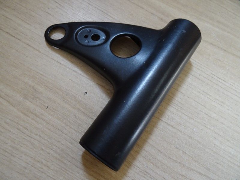 Patte de phare gauche Triumph Bonneville T100 2005/2016